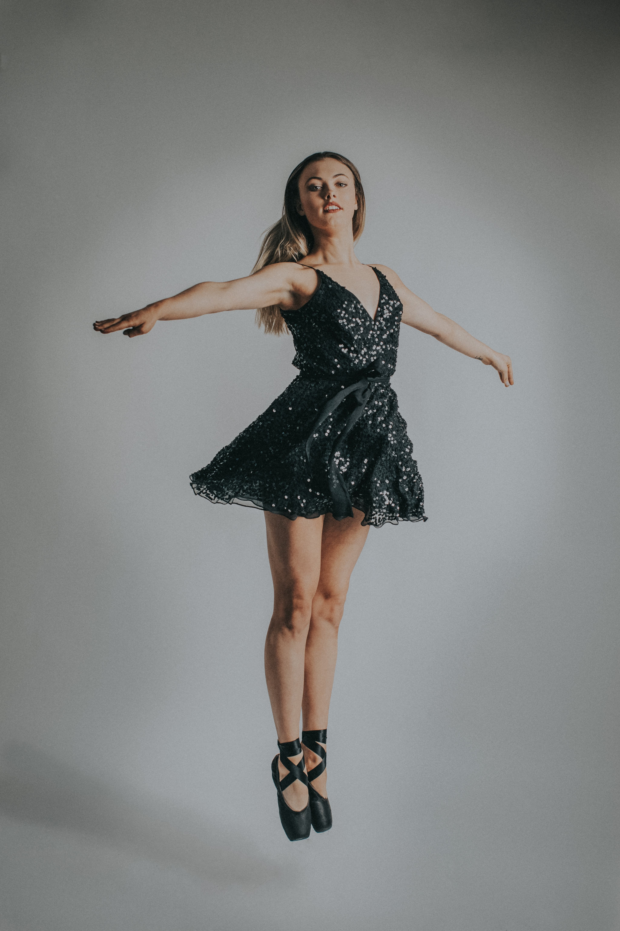 dancer jumps - black dress - ballerina outfit