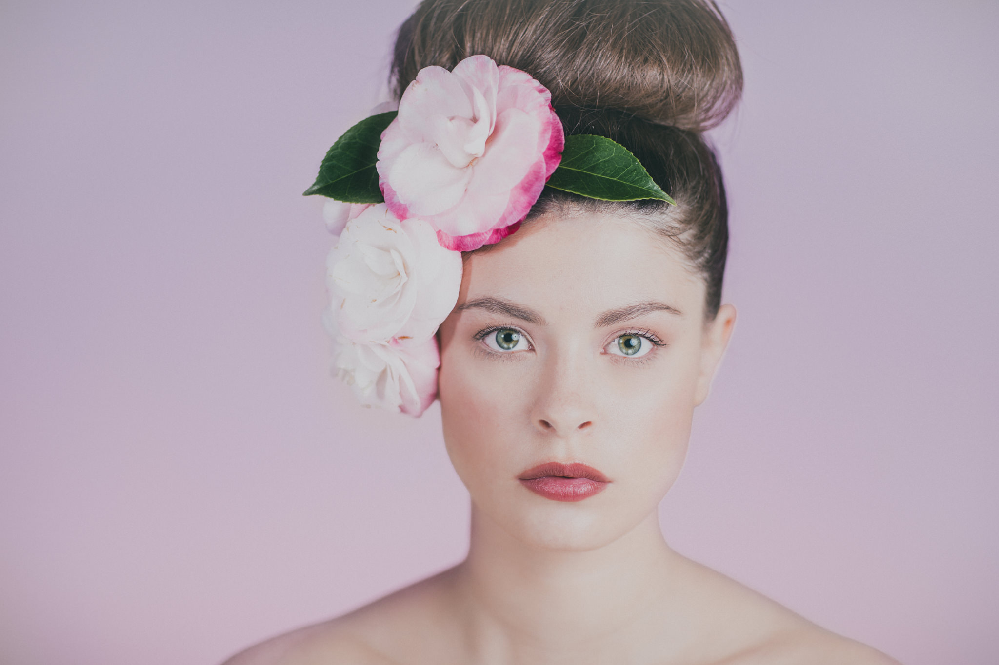 flower portrait of girl with pink background - beauty photography in australia